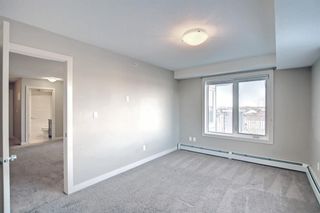 Photo 13: 1408 6118 80 Avenue NE in Calgary: Saddle Ridge Apartment for sale : MLS®# A1191237