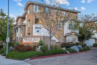 Main Photo: SABRE SPR Townhouse for sale : 2 bedrooms : 13051 Evening Creek Dr S #48 in San Diego