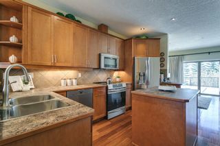 Photo 5: 17 11 Scarpe Drive SW in Calgary: Garrison Woods Row/Townhouse for sale : MLS®# A1103969