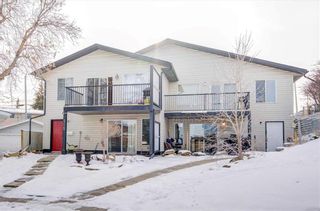 Photo 2: 505 34 Avenue NE in Calgary: Winston Heights/Mountview Semi Detached (Half Duplex) for sale : MLS®# A2107035