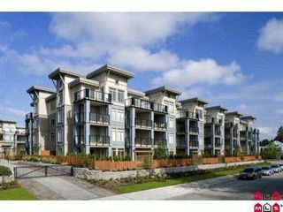 Photo 1: 323 10180 153RD Street in Surrey: Guildford Condo for sale in "CHARLTON PARK" (North Surrey)  : MLS®# F1129375