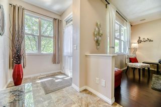 Photo 4: 13 Chaparral Valley Park SE in Calgary: Chaparral Duplex for sale : MLS®# A1228411