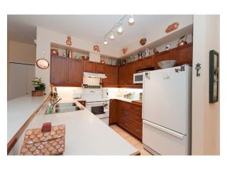 Photo 4: 108 6198 ASH Street in Vancouver: Oakridge VW Condo for sale in "THE GROVE" (Vancouver West)  : MLS®# V843824