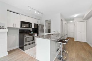 Photo 1: 303 3240 ST JOHNS Street in Port Moody: Port Moody Centre Condo for sale in "The Square" : MLS®# R2761361