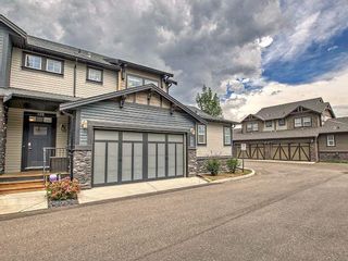 Photo 2: 403 110 Coopers Common SW: Airdrie Row/Townhouse for sale : MLS®# A2073248
