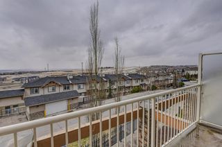 Photo 17: 7 124 Rockyledge View NW in Calgary: Rocky Ridge Row/Townhouse for sale : MLS®# A1111501