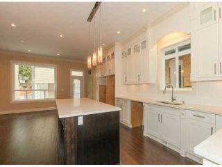 Photo 3: 5970 131ST Street in Surrey: Panorama Ridge House for sale : MLS®# F1425192