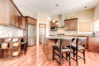 Photo 7: 301 Everglade Circle SW in Calgary: Evergreen Detached for sale : MLS®# A1185131