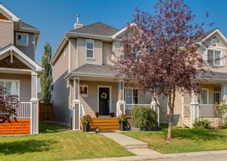Photo 1: 210 Cougartown Circle SW in Calgary: Cougar Ridge Detached for sale : MLS®# A2078894
