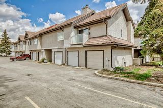 Photo 1: 207 1997 Sirocco Drive SW in Calgary: Signal Hill Row/Townhouse for sale : MLS®# A2047581
