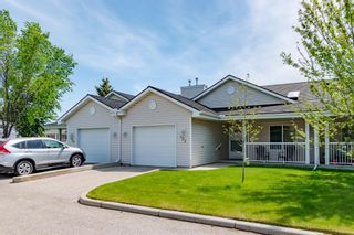 Photo 1: 122 305 FIRST Avenue NW: Airdrie Row/Townhouse for sale : MLS®# A1234492