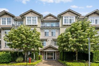 Photo 1: 404 15323 17A Avenue in Surrey: King George Corridor Condo for sale in "SEMIAMOO PLACE" (South Surrey White Rock)  : MLS®# R2822142