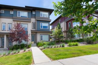 Photo 2: 201 501 River Heights Drive: Cochrane Row/Townhouse for sale : MLS®# A1250960