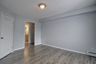 Photo 35: 7402 304 MacKenzie Way SW: Airdrie Apartment for sale : MLS®# A1081028