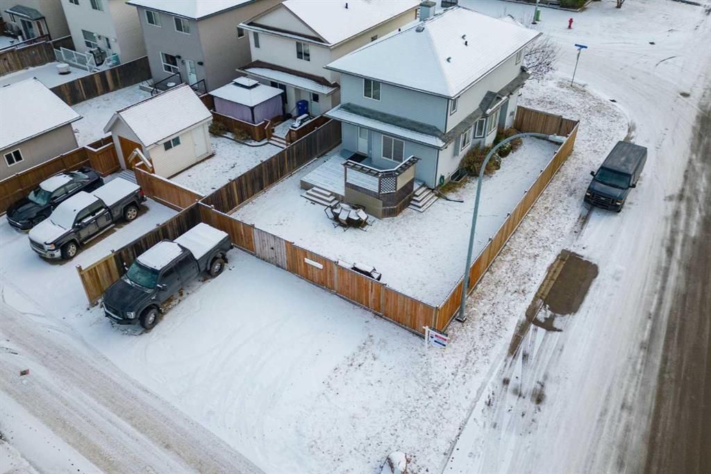View of home and yard from above