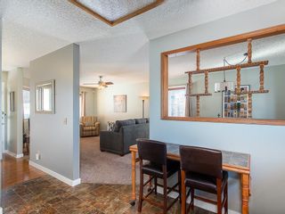 Photo 9: 12 140 STRATHAVEN Circle SW in Calgary: Strathcona Park Semi Detached for sale : MLS®# C4229318