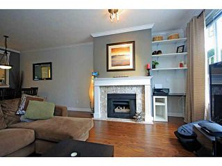 Photo 1: 107 2340 HAWTHORNE Avenue in Port Coquitlam: Central Pt Coquitlam Condo for sale in "BARRINGTON PLACE" : MLS®# V1097959