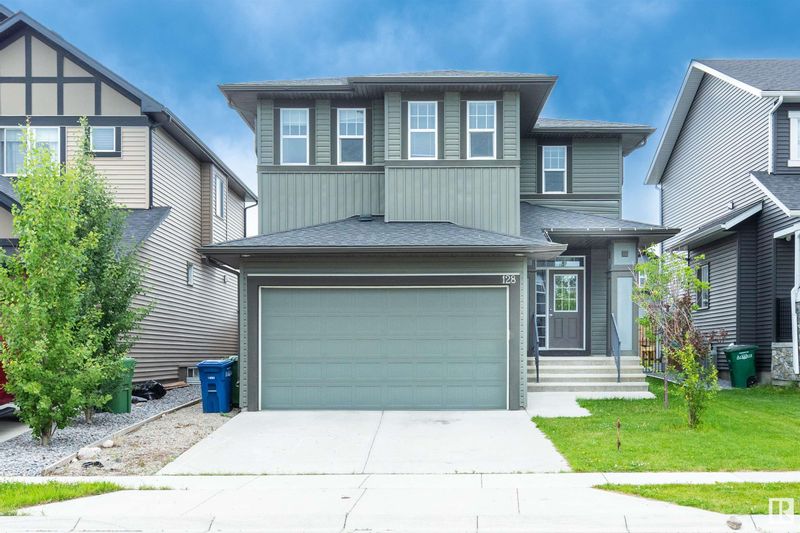FEATURED LISTING: 128 RAVENSKIRK Close Southeast Airdrie