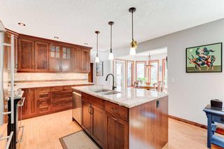Photo 13: 324 Coach Grove Place SW in Calgary: Coach Hill Detached for sale : MLS®# A2121292