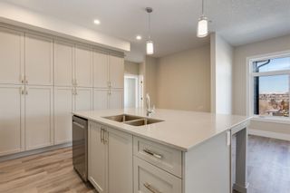 Photo 5: 410 1702 17 Avenue SW in Calgary: Scarboro Apartment for sale : MLS®# A2032534