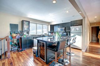 Photo 5: 49 ROSSDALE Road SW in Calgary: Rosscarrock Detached for sale : MLS®# A2014032