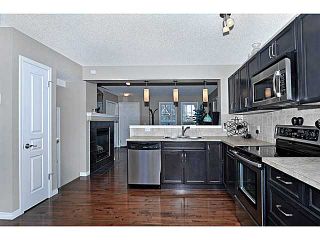 Photo 7: 114 ELGIN MEADOWS Gardens SE in CALGARY: McKenzie Towne Residential Attached for sale (Calgary)  : MLS®# C3542385