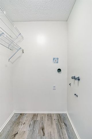 Photo 26: 205 309 Woodside Drive NW: Airdrie Apartment for sale : MLS®# A2012909