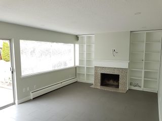 Photo 2: 2645 WESTVIEW Drive in North Vancouver: Upper Lonsdale Townhouse for sale in "Cypress Gardens" : MLS®# R2759410