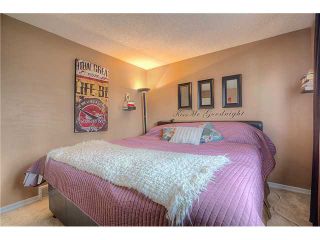 Photo 10: 869 QUEENSLAND Drive SE in CALGARY: Queensland Residential Attached for sale (Calgary)  : MLS®# C3616074