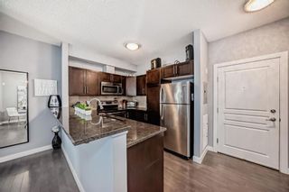 Photo 3: 103 76 Panatella Road NW in Calgary: Panorama Hills Apartment for sale : MLS®# A2126978