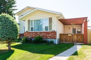 Photo 2: 534 QUEENSLAND Place SE in Calgary: Queensland Semi Detached for sale : MLS®# A1020359
