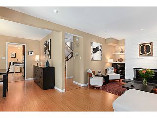 Photo 3: 1065 HERITAGE Boulevard in North Vancouver: Seymour Townhouse for sale in "HERITAGE IN THE WOODS" : MLS®# V1026380