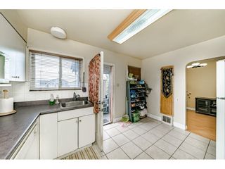 Photo 10: 1414 E 60TH Avenue in Vancouver: Fraserview VE House for sale (Vancouver East)  : MLS®# R2396473