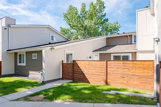 Photo 2: 1003 13104 Elbow Drive SW in Calgary: Canyon Meadows Row/Townhouse for sale : MLS®# A1238328
