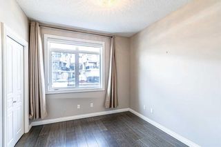 Photo 12: 12 133 Rockyledge View NW in Calgary: Rocky Ridge Row/Townhouse for sale : MLS®# A2120270