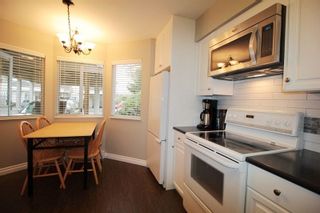 Photo 6: 7 7560 138 Street in Surrey: East Newton Townhouse for sale in "Parkside" : MLS®# R2217350