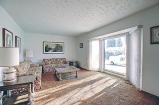 Photo 4: 4416 8 Avenue SW in Calgary: Rosscarrock Detached for sale : MLS®# A1155473