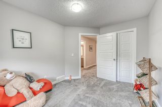 Photo 21: 510 130 New Brighton Way SE in Calgary: New Brighton Row/Townhouse for sale : MLS®# A1218934