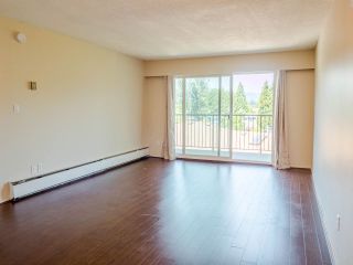 Photo 11: 414 630 CLARKE Road in Coquitlam: Coquitlam West Condo for sale in "King Charles Court" : MLS®# R2556475