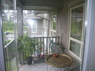 Photo 8: 415 3110 DAYANEE SPRINGS Boulevard in Coquitlam: Westwood Plateau Condo for sale in "LEDGEVIEW" : MLS®# V963345