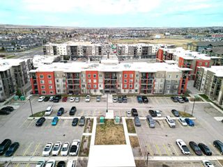 Photo 2: 211 403 Mackenzie Way SW: Airdrie Apartment for sale : MLS®# A2125740