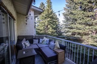 Photo 13: 106 Strathlorne Mews SW in Calgary: Strathcona Park Row/Townhouse for sale : MLS®# A1174641