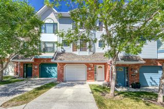 Photo 1: 5475 Patina Drive SW in Calgary: Patterson Row/Townhouse for sale : MLS®# A1220360