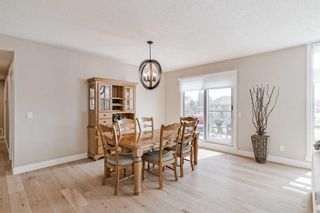 Photo 5: 409 15 Cougar Ridge Landing SW in Calgary: Patterson Apartment for sale : MLS®# A2127724
