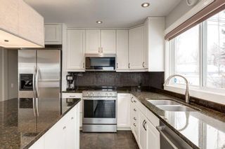 Photo 15: 105 Rosery Drive NW in Calgary: Rosemont Detached for sale : MLS®# A2102330