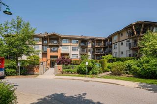 Photo 2: 310 300 KLAHANIE Drive in Port Moody: Port Moody Centre Condo for sale in "TIDES" : MLS®# R2779830