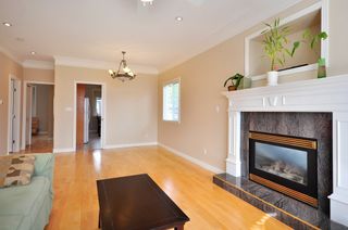 Photo 2: 1125 E 61st Avenue in Vancouver: Home for sale : MLS®# V819065