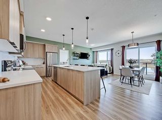 Photo 4: 2208 42 Cranbrook Gardens SE in Calgary: Cranston Apartment for sale : MLS®# A2113593