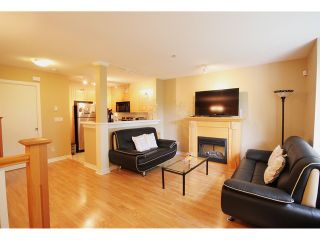 Photo 1: 64 7128 STRIDE Avenue in Burnaby: Edmonds BE Townhouse for sale in "RIVERSTONE" (Burnaby East)  : MLS®# V1063583