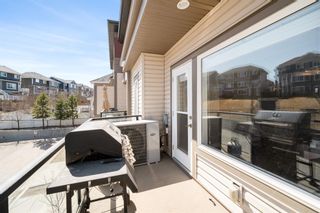 Photo 14: 104 501 River Heights Drive: Cochrane Row/Townhouse for sale : MLS®# A1204085